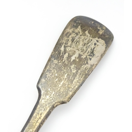 289 - A George IV silver basting / stuffing spoon. Hallmarked London 1823 maker Clement Cheese. Approx 11 ... 