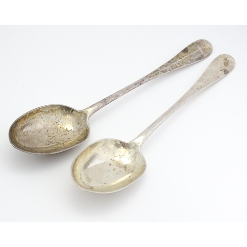 299 - A pair of silver basting / stuffing spoons hallmarked London 1928 . maker Francis Higgins & Son Ltd.... 