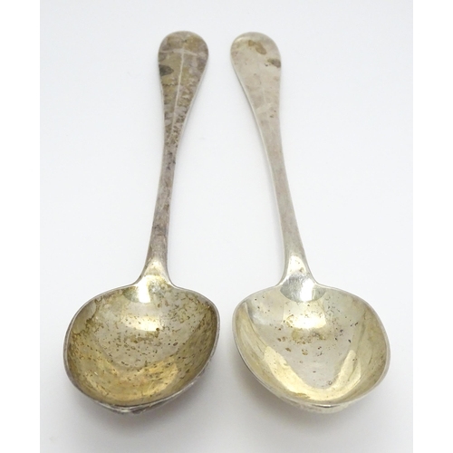 299 - A pair of silver basting / stuffing spoons hallmarked London 1928 . maker Francis Higgins & Son Ltd.... 