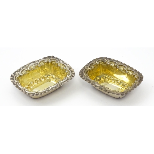 316 - Two silver salts with embossed decoration and gilded interiors hallmarked Birmingham 1901 maker Will... 