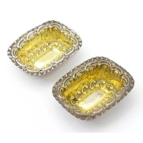 316 - Two silver salts with embossed decoration and gilded interiors hallmarked Birmingham 1901 maker Will... 