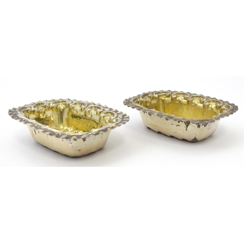 316 - Two silver salts with embossed decoration and gilded interiors hallmarked Birmingham 1901 maker Will... 