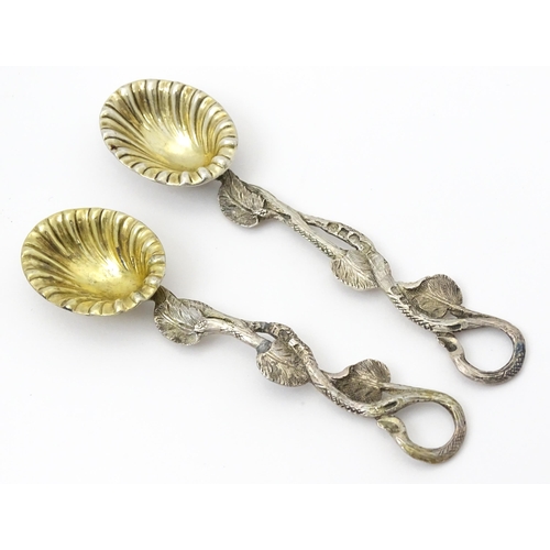 316 - Two silver salts with embossed decoration and gilded interiors hallmarked Birmingham 1901 maker Will... 