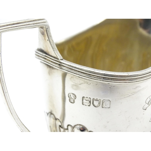 348 - A silver cream jug with engraved armorial titled ' Light on '  hallmarked London 1898 maker Charles ... 