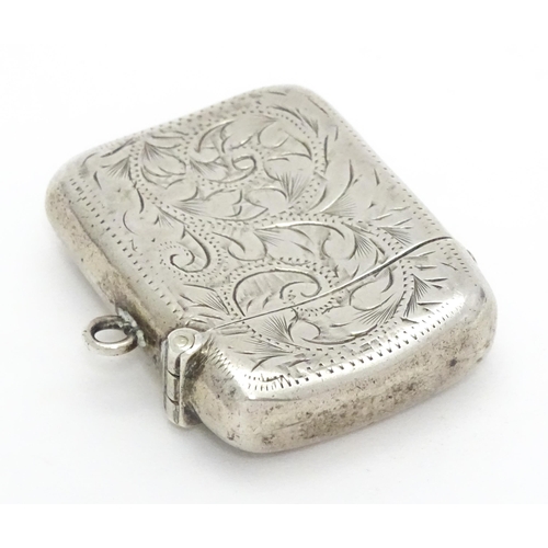 241 - A silver vesta case with acanthus scroll decoration hallmarked Birmingham 1902, maker Joseph Gloster... 