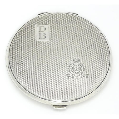 285 - An Art Deco silver compact with engine turned decoration bearing military insignia to lid for RAF 61... 