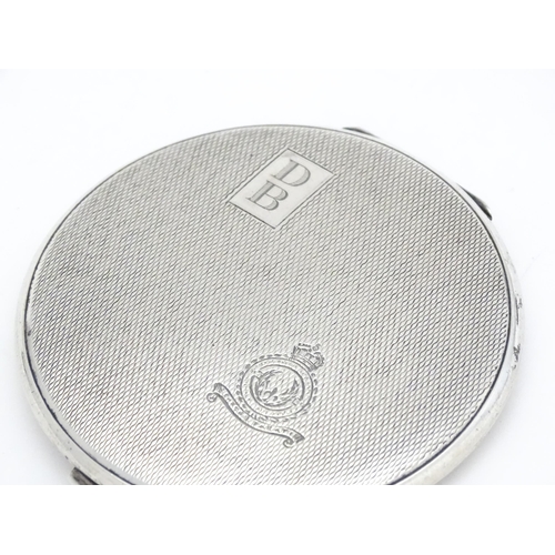 285 - An Art Deco silver compact with engine turned decoration bearing military insignia to lid for RAF 61... 