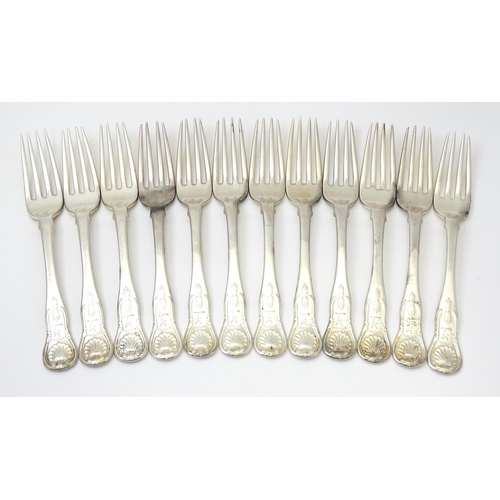 304 - Twelve George IV Scottish silver dessert forks, with engraved armorials titled 'Steady'  hallmarked ... 