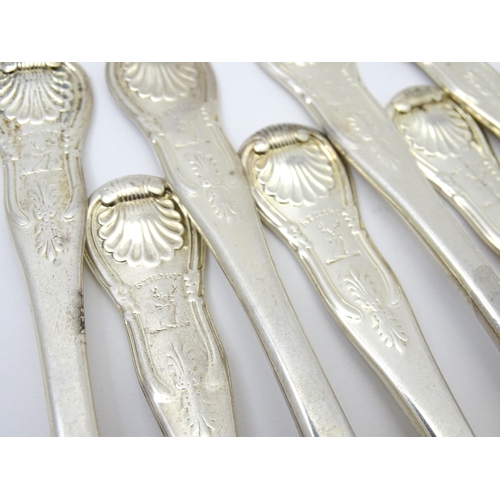 304 - Twelve George IV Scottish silver dessert forks, with engraved armorials titled 'Steady'  hallmarked ... 