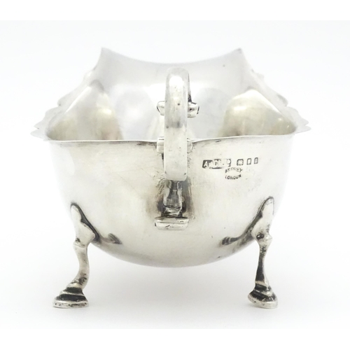 327 - A silver saucer boat hallmarked London 1931, maker Asprey & Co. Ltd. Approx. 6 1/2