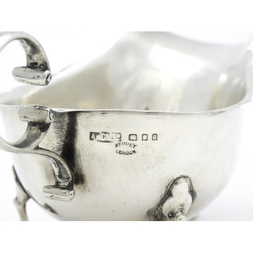 327 - A silver saucer boat hallmarked London 1931, maker Asprey & Co. Ltd. Approx. 6 1/2