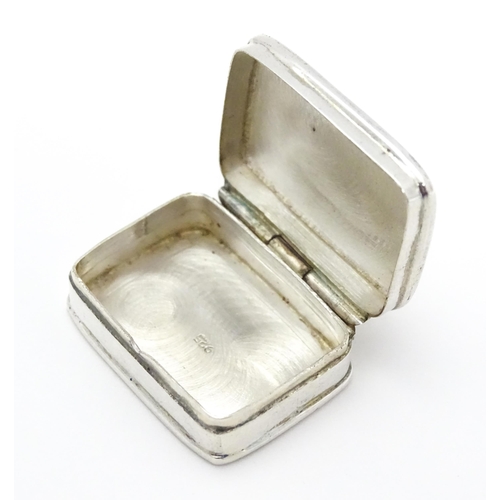 353 - A .925 silver pill box. Approx. 1 1/4