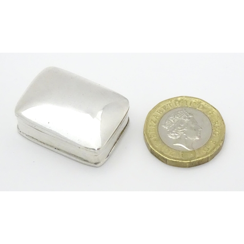 353 - A .925 silver pill box. Approx. 1 1/4