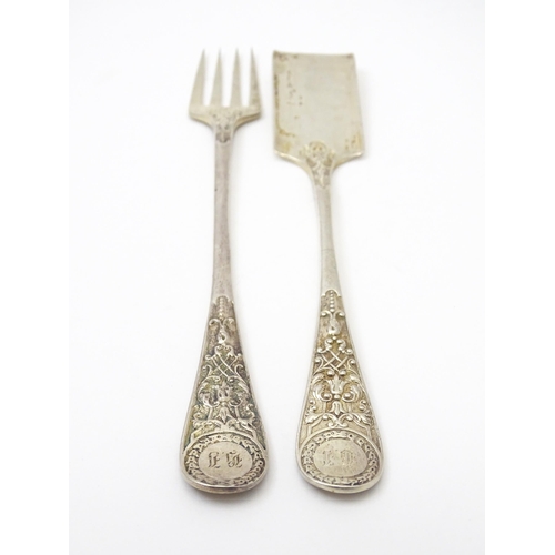 371 - A pair of Victorian silver servers, hallmarked London 1883, maker Martin, Hall & Co. Approx. 7 1/4