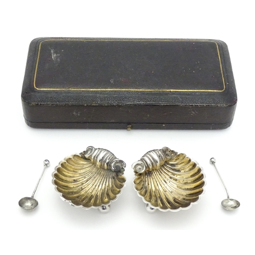 390 - A pair of Victorian silver salts of scallop shape hallmarked Birmingham 1893, maker Joseph Whitten. ... 