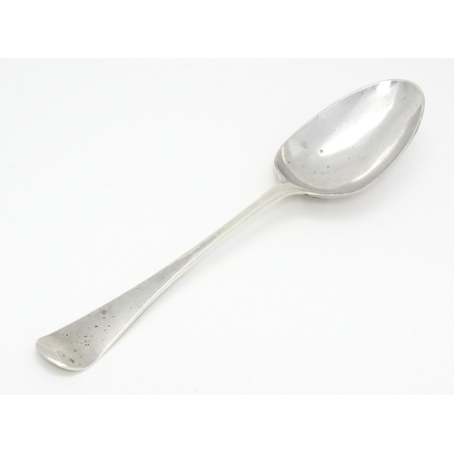 258 - A George II silver tablespoon hallmarked London 1751, maker Ebenezer Coker. Approx. 7 3/4