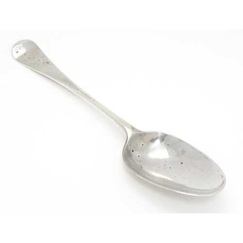 258 - A George II silver tablespoon hallmarked London 1751, maker Ebenezer Coker. Approx. 7 3/4