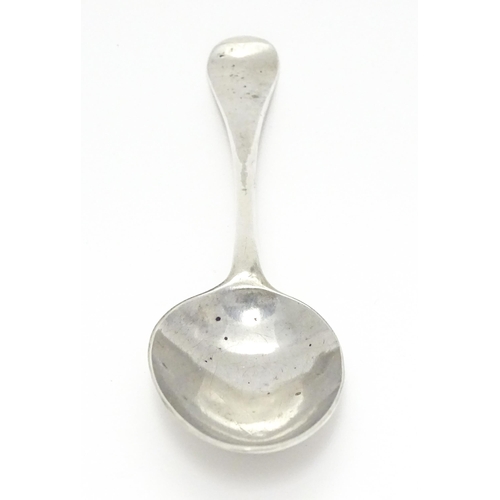 258 - A George II silver tablespoon hallmarked London 1751, maker Ebenezer Coker. Approx. 7 3/4