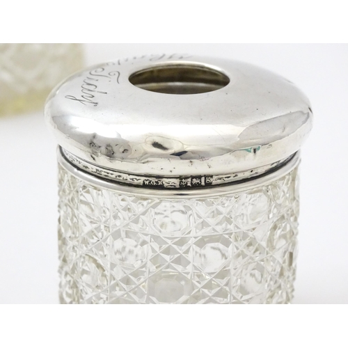 295 - A cut glass dressing table jar with silver lid hallmarked Birmingham 1902, maker J. Collyer & Co. td... 