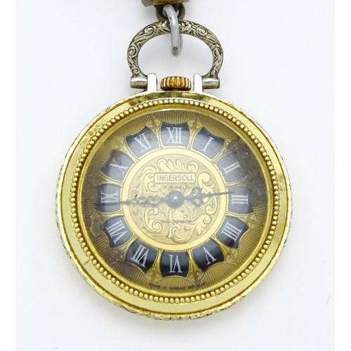 799 - An Ingersoll fob watch with floral decoration to case and with a gilt metal hanger. The watch 1 1/4