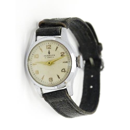 824 - Seven assorted wristwatches to include examples by Smiths, Paragon, Andrew, Oris, etc. Together with... 