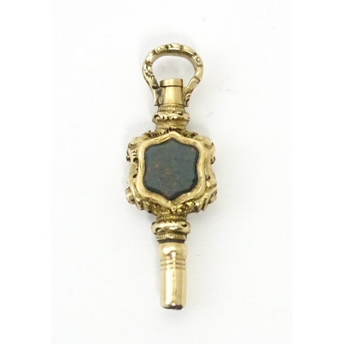 797 - A Victorian pocket watch key set with bloodstone detail. Approx. 1