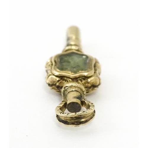 797 - A Victorian pocket watch key set with bloodstone detail. Approx. 1