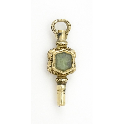 797 - A Victorian pocket watch key set with bloodstone detail. Approx. 1