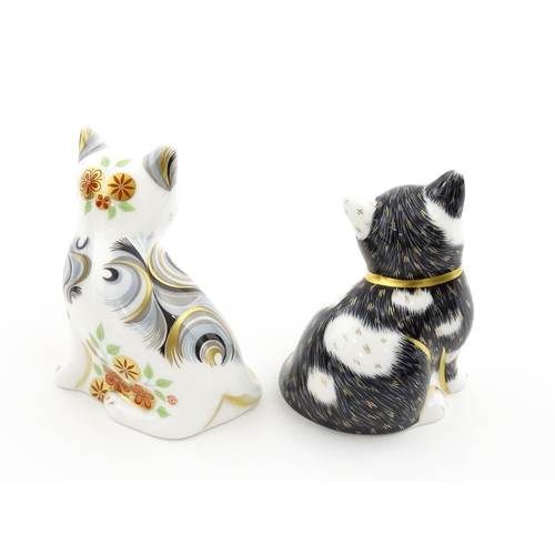 113 - Two Royal Crown Derby paperweights modelled as seated cats, one titled Black & White Kitten. Marked ... 