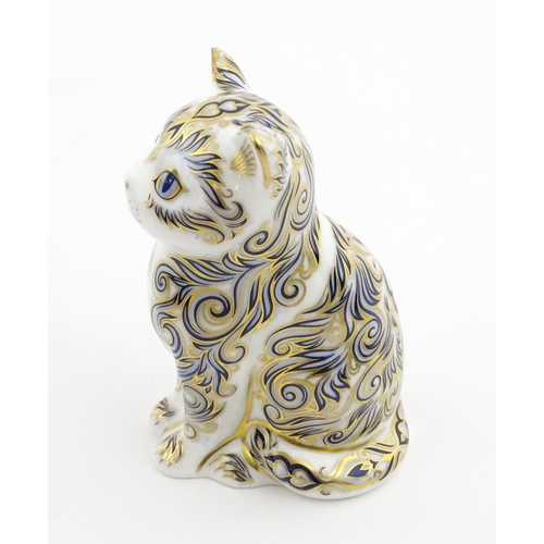 114 - Two Royal Crown Derby paperweights modelled as cats, one a limited edition example titled Majestic K... 