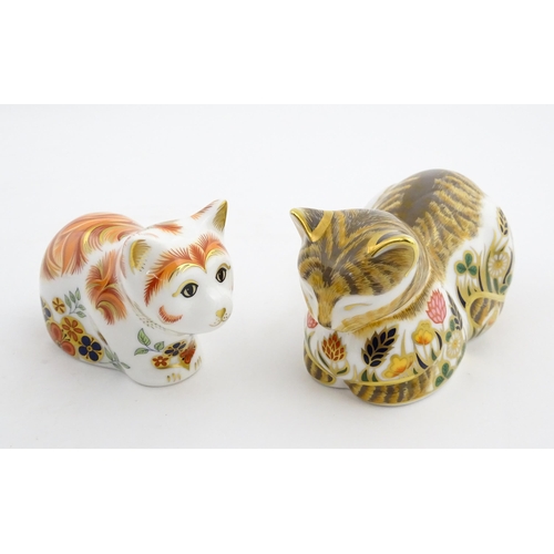 115 - Two Royal Crown Derby paperweights modelled as cats, one titled Cottage Garden Cat. Marked under. Bo... 