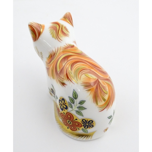 115 - Two Royal Crown Derby paperweights modelled as cats, one titled Cottage Garden Cat. Marked under. Bo... 