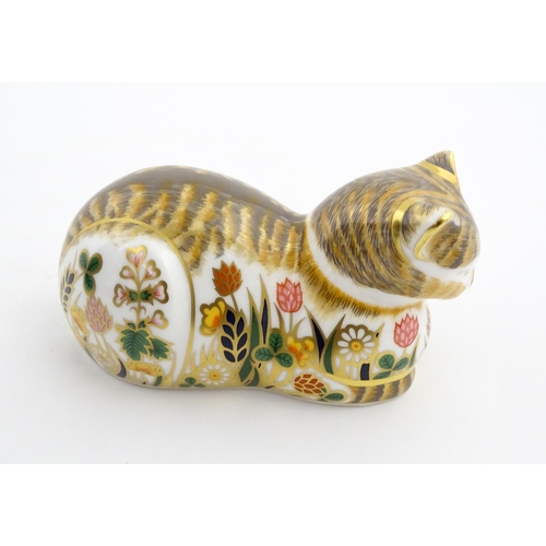 115 - Two Royal Crown Derby paperweights modelled as cats, one titled Cottage Garden Cat. Marked under. Bo... 