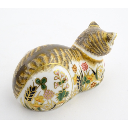 115 - Two Royal Crown Derby paperweights modelled as cats, one titled Cottage Garden Cat. Marked under. Bo... 