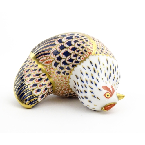 116 - A Royal Crown Derby paperweight modelled as a chicken. Marked under. Boxed. Approx. 4