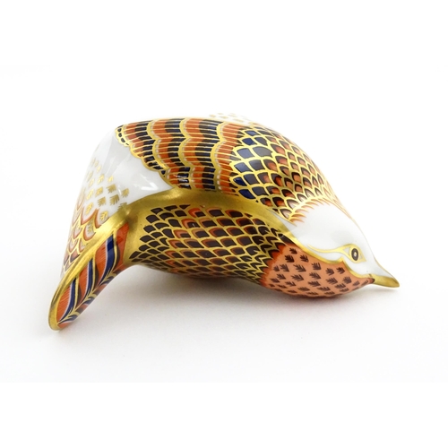 117 - A Royal Crown Derby paperweight modelled as a wren. Marked under. Boxed. Approx. 3 1/2