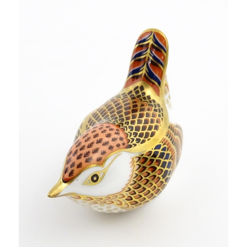 117 - A Royal Crown Derby paperweight modelled as a wren. Marked under. Boxed. Approx. 3 1/2