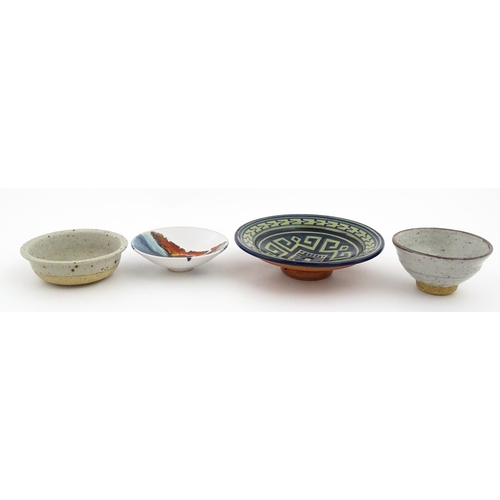 128 - Four assorted ceramic items to include a small Oriental bowl with brushwork detail, a footed dish wi... 