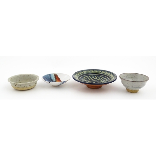 128 - Four assorted ceramic items to include a small Oriental bowl with brushwork detail, a footed dish wi... 