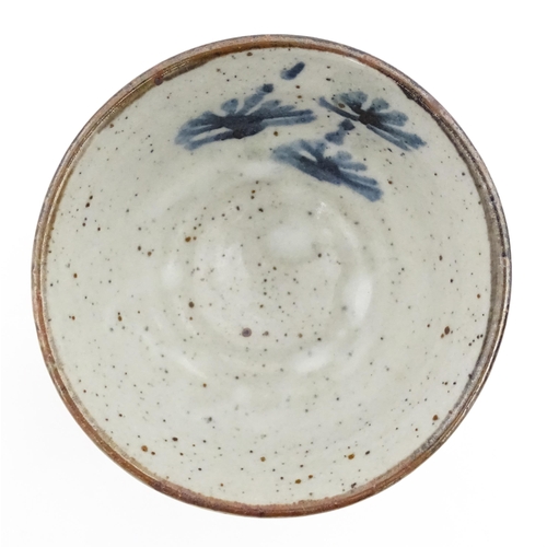 128 - Four assorted ceramic items to include a small Oriental bowl with brushwork detail, a footed dish wi... 