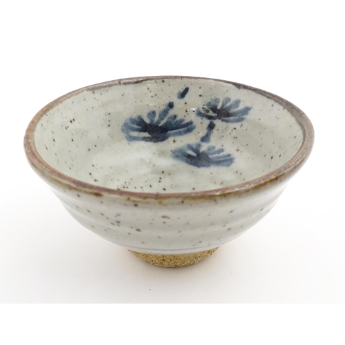 128 - Four assorted ceramic items to include a small Oriental bowl with brushwork detail, a footed dish wi... 