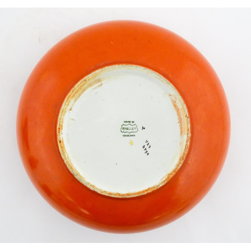 139 - A Carlton Ware pedestal bowl with twin handled and relief foliate detail. Marked under Rouge Royale.... 