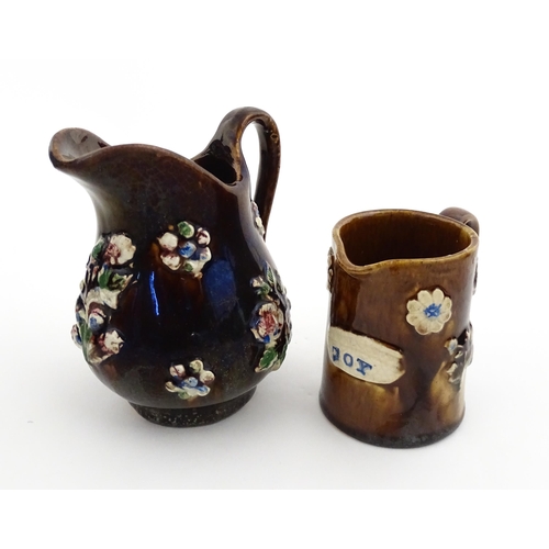 155 - Four items of 19thC Measham bargeware to include a jug floral and foliate detail and the motto A Pre... 