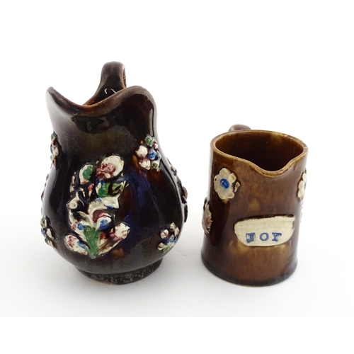 155 - Four items of 19thC Measham bargeware to include a jug floral and foliate detail and the motto A Pre... 