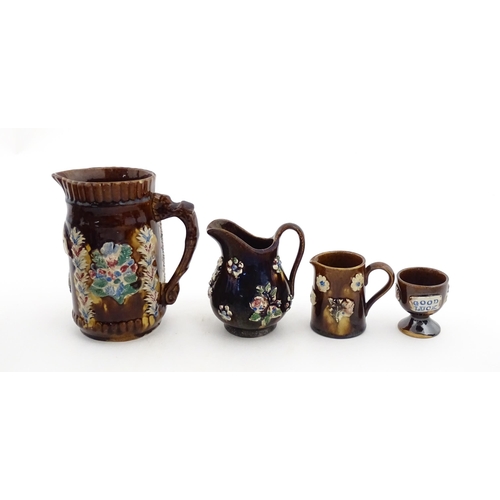 155 - Four items of 19thC Measham bargeware to include a jug floral and foliate detail and the motto A Pre... 