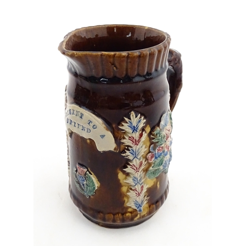 155 - Four items of 19thC Measham bargeware to include a jug floral and foliate detail and the motto A Pre... 