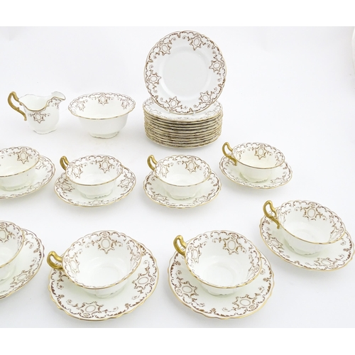 165 - A quantity of Royal Doulton tea wares with gilt decoration to include milk jug, sugar bowl, cups, sa... 