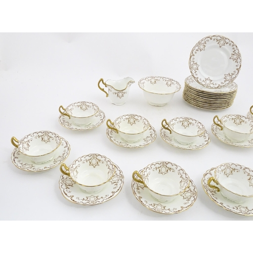 165 - A quantity of Royal Doulton tea wares with gilt decoration to include milk jug, sugar bowl, cups, sa... 