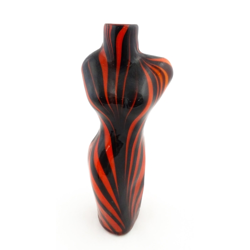 176 - A late 20thC glass vase modelled as a female torso with red and black detail. Approx 17 1/2