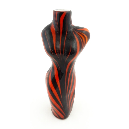 176 - A late 20thC glass vase modelled as a female torso with red and black detail. Approx 17 1/2